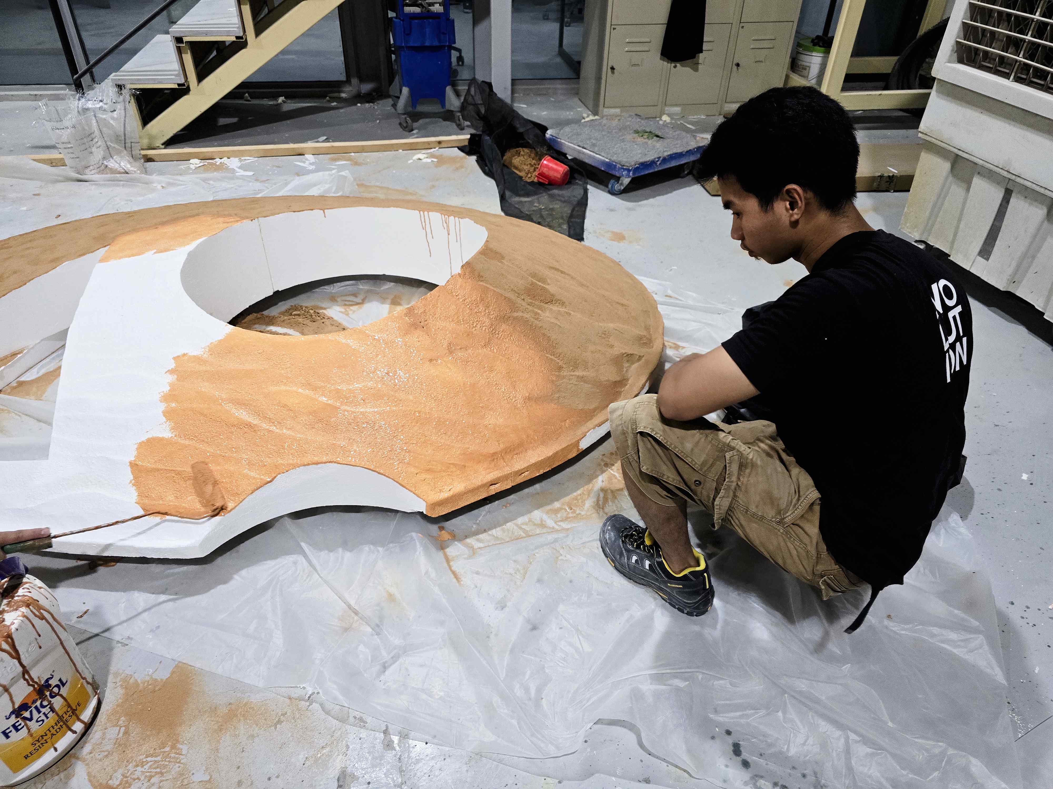 Lightweight composite and foam scenic forms being shaped and prepared for finishing.