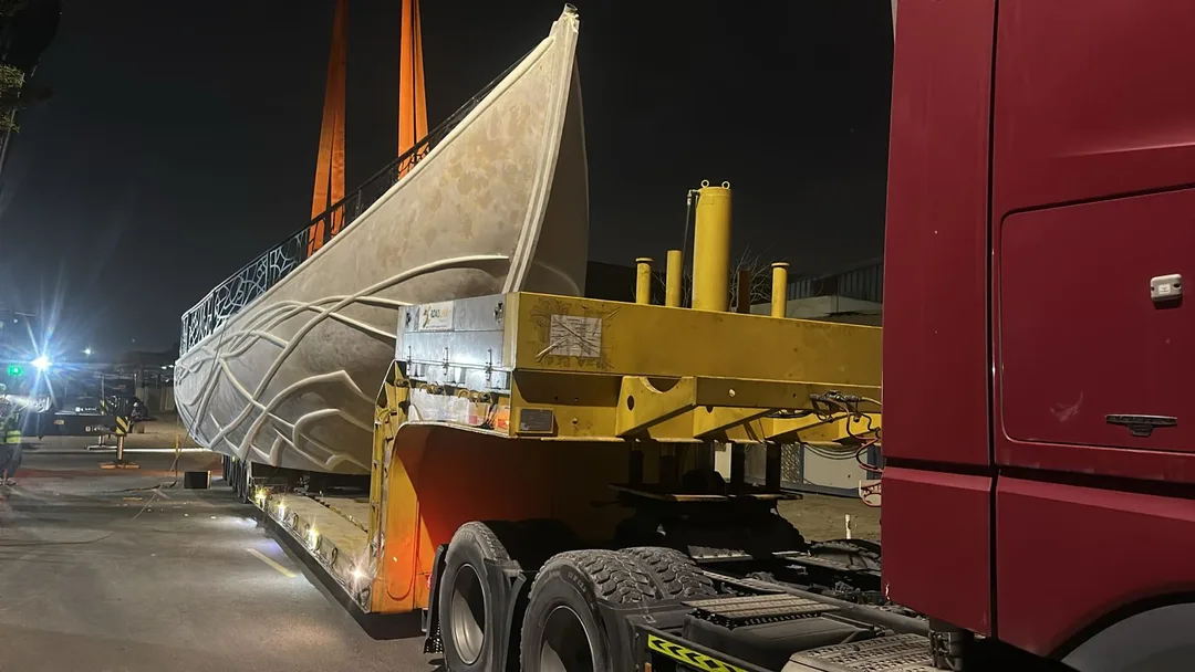 Separate scenic modules loaded for transport with engineered lifting and handling points.
