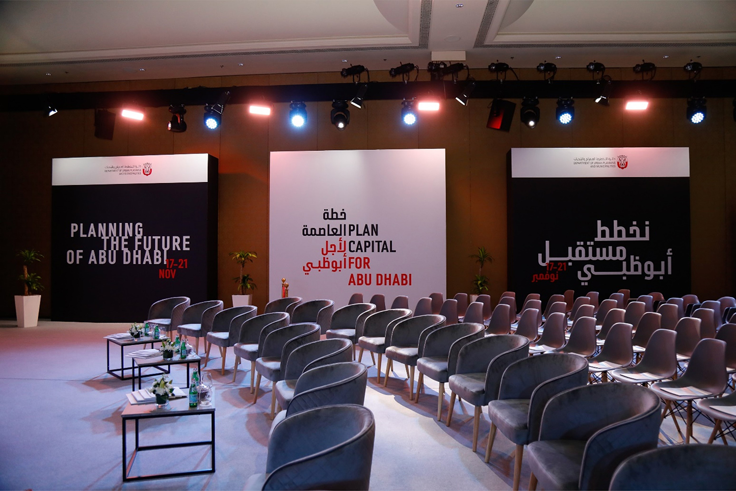 PLAN Capital main stage with dimensional backdrop, skyline scenery and venue screen integration.