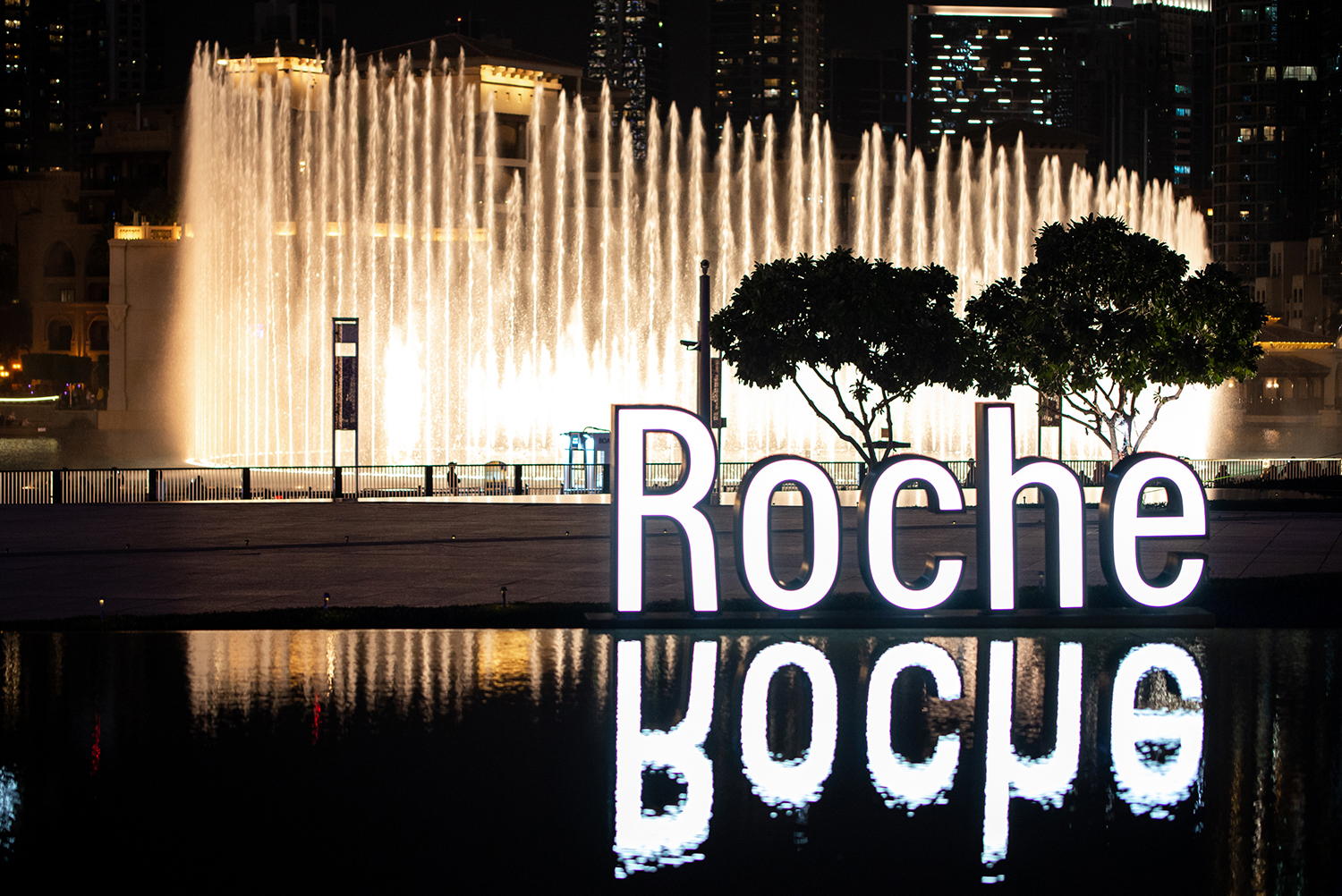 Acrylic, fabric and painted scenic finishes used across the Roche environment.