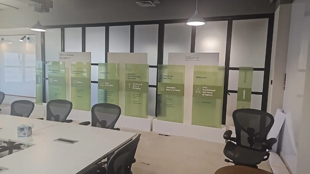 Coordinated ADEO scenic installation combining MDF walls, acrylic displays and printed graphics.