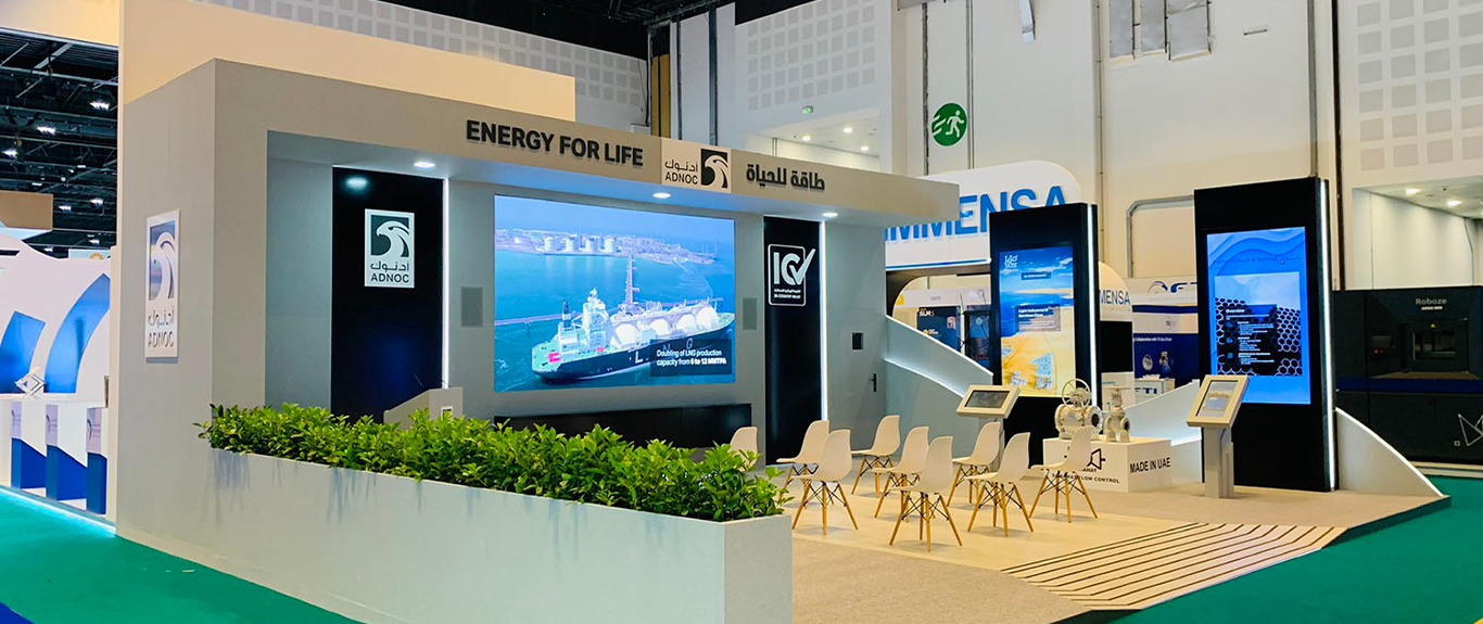 Custom scenic planter integrated into the ADNOC exhibition stand architecture at ADIPEC Abu Dhabi.