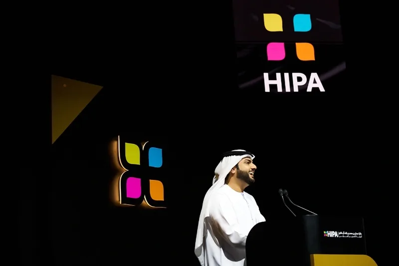 HIPA branded logo in stage backlit