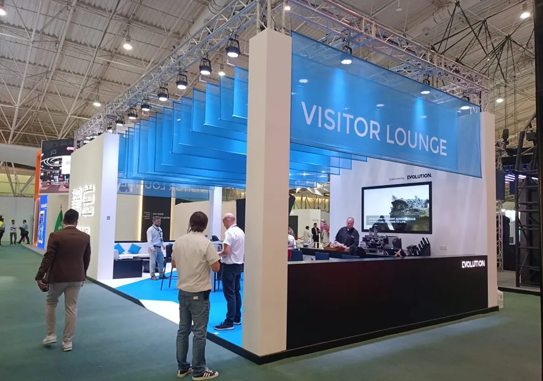 Evolution Scenic SES Lounge fabrication combining scenic walls, furniture and technical displays.