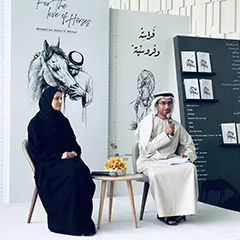 Evolution Scenic presentation stage and branded backdrop for the Dubai book launch.