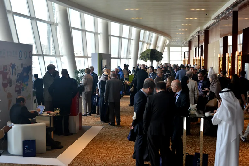 Delegates gathering within the branded foyer and networking area at The Principals Symposium in Dubai.