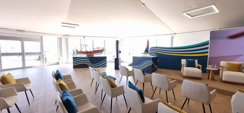 Evolution Scenic branded display plinths and scenic walling within the Mubadala SailGP hospitality interior.