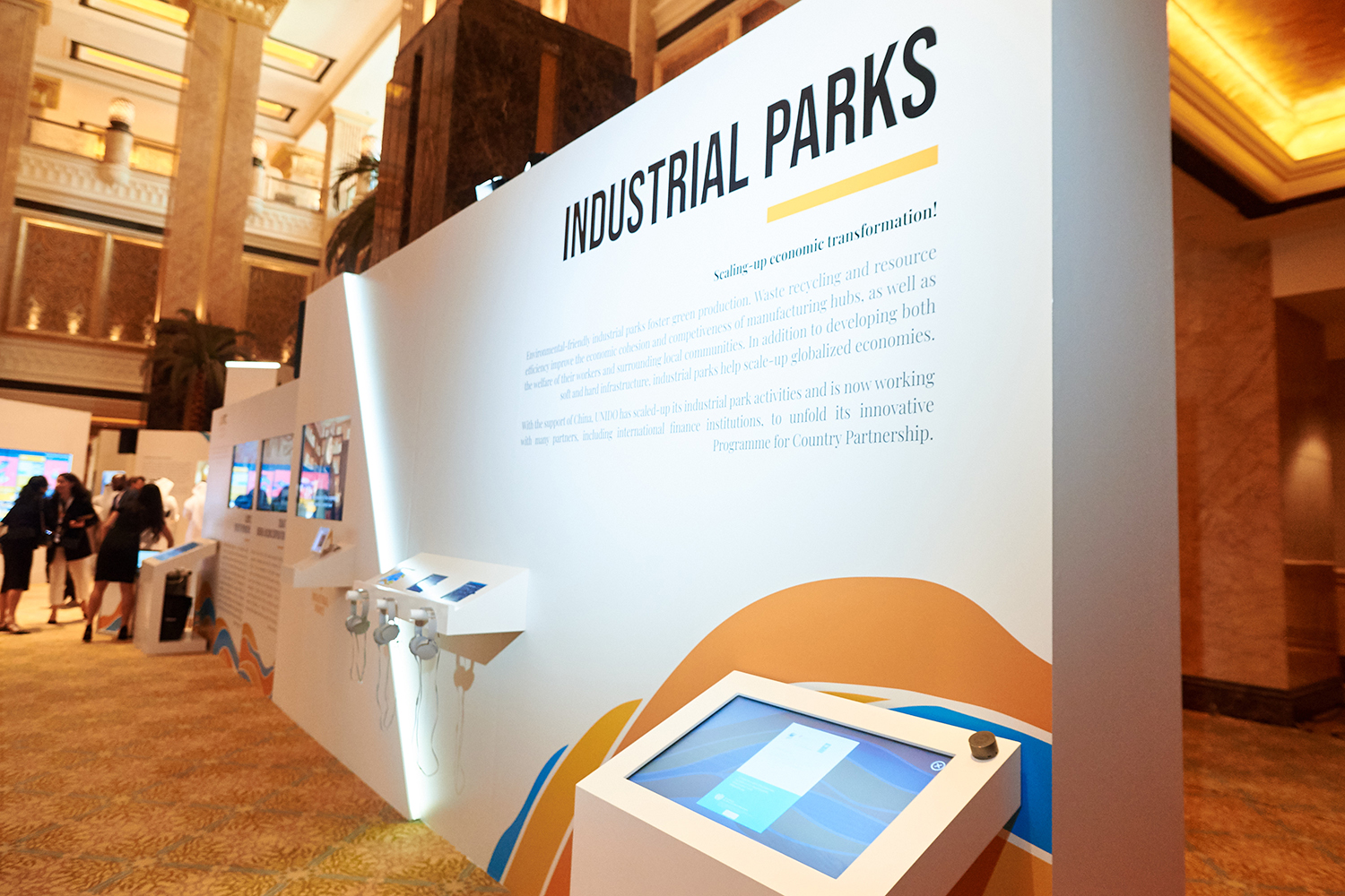 Bespoke scenic plinth integrating touchscreen technology and concealed technical infrastructure
