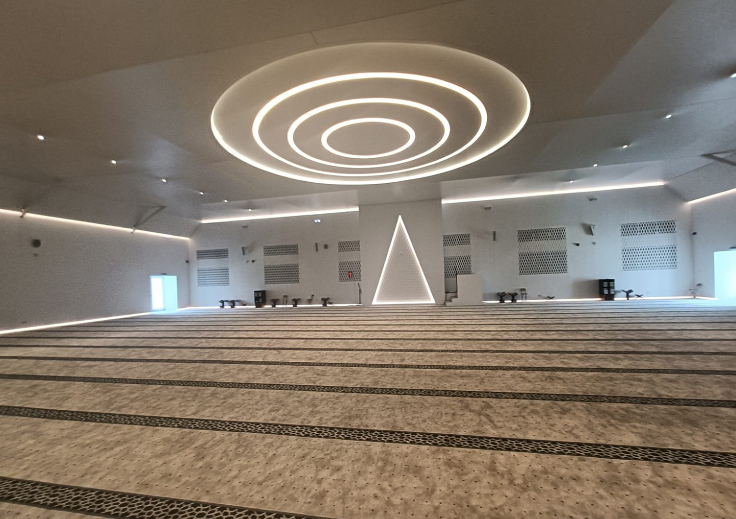 Prayer-hall ceiling construction incorporating lighting and air-conditioning service details.