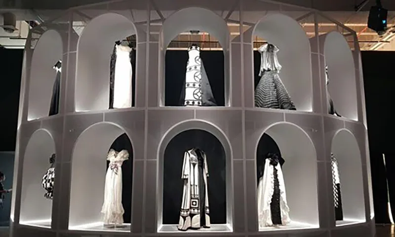 Colosseum-inspired scenic construction manufactured for the Forever Valentino exhibition galleries.