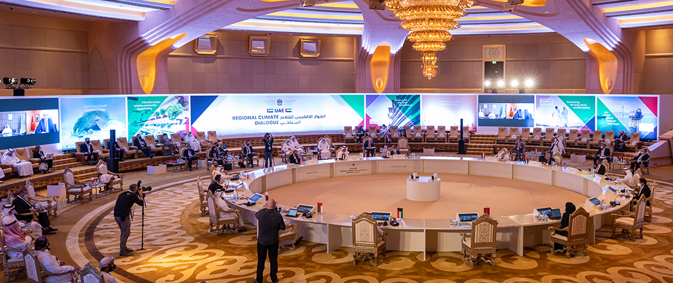 Evolution Scenic branded stage and angled graphic walls for the UAE Regional Climate Dialogue.