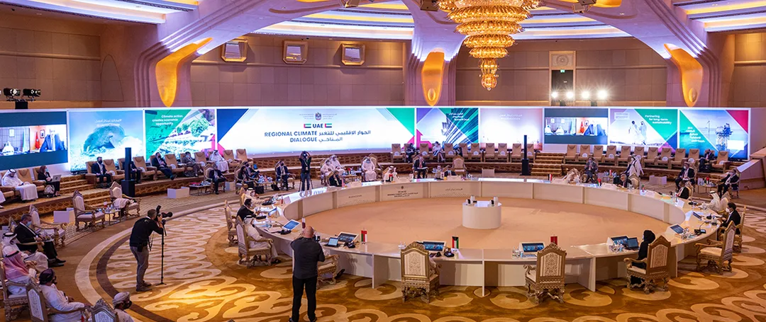 Evolution Scenic branded stage and angled graphic walls for the UAE Regional Climate Dialogue.
