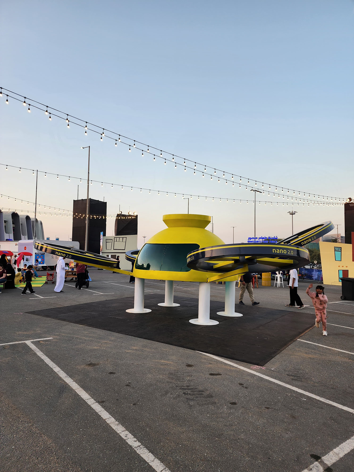 Evolution Scenic large-scale Nano Robot with four modular wings at Zayed Sports Complex.