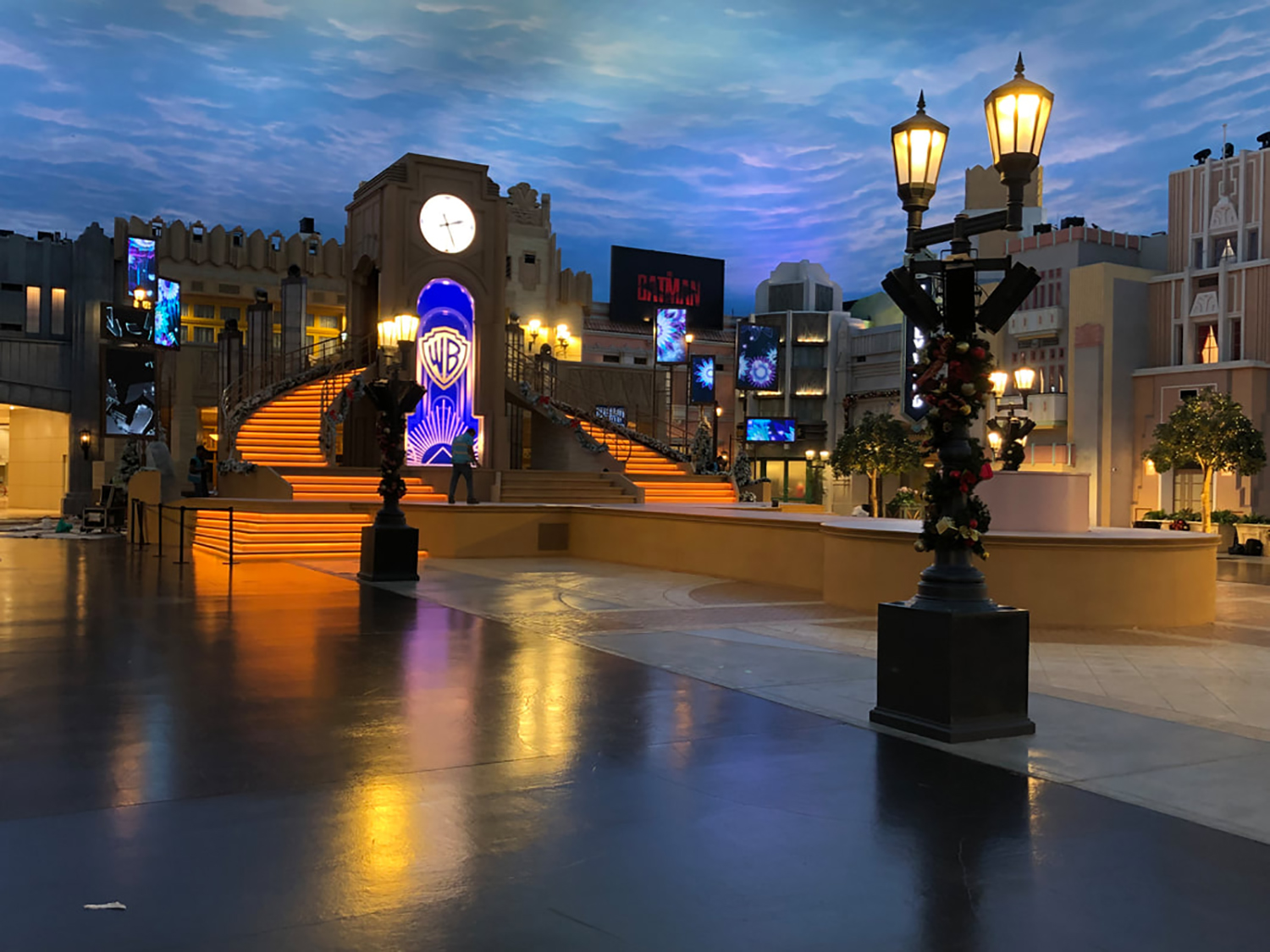 Evolution Scenic integrated lighting illuminating the clock tower, staircases and scenic screen structures.