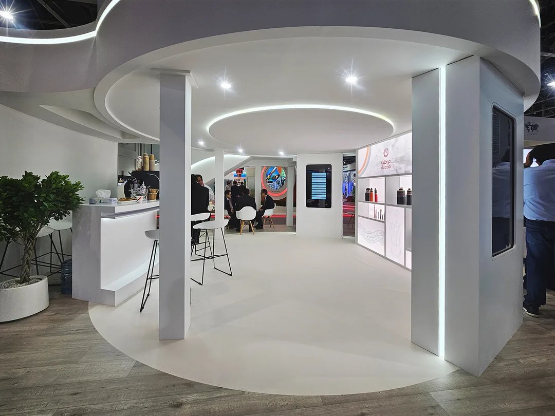 MDF coffee counter with concealed cove lighting inside the DUCAB exhibition stand.