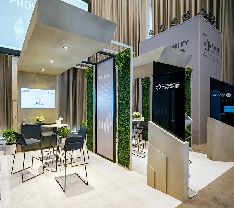 Bespoke exhibition portal with painted MDF surfaces and integrated digital display