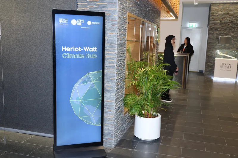 Evolution Scenic custom freestanding LED screen stand integrated with the branded venue environment.