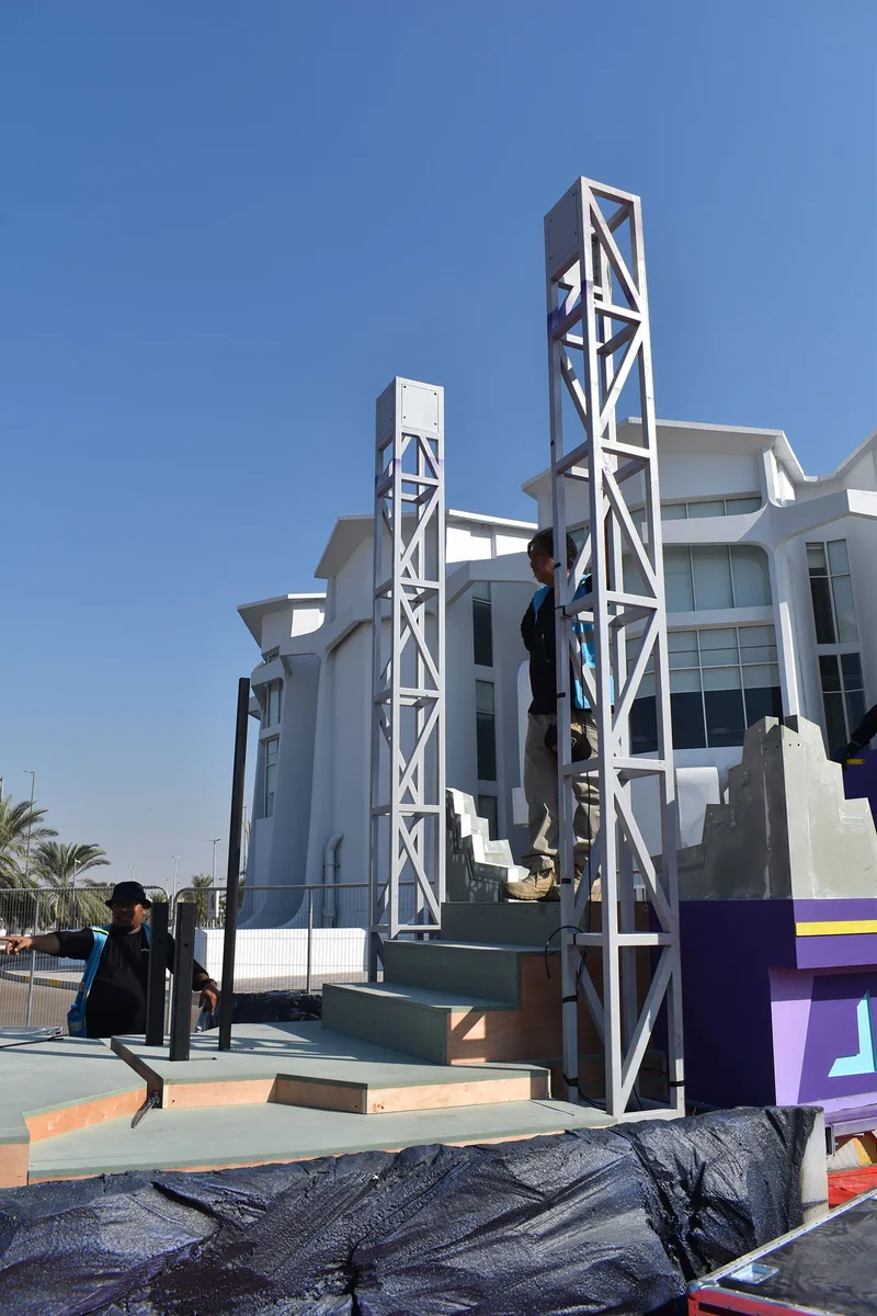 Custom metal support towers fitted to a Mansour Festival parade truck before the scenic cladding is completed.