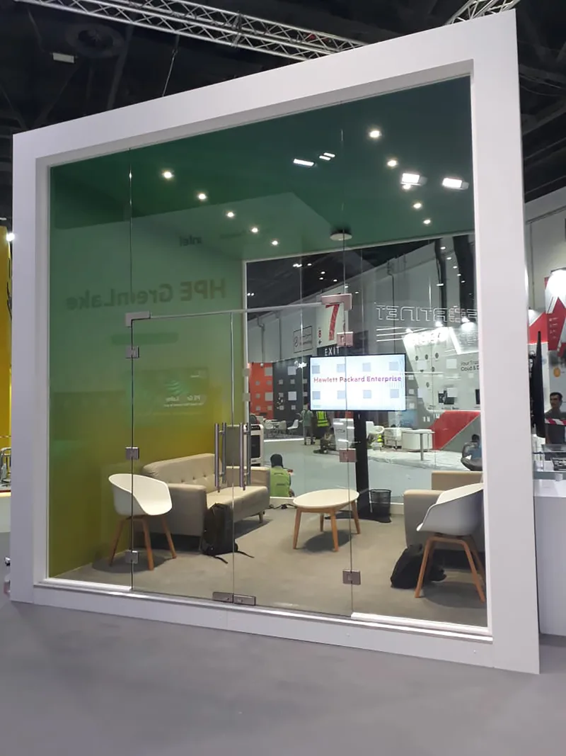 HPE GITEX Dubai meeting room with clear glass walls, double glass doors and integrated AV.