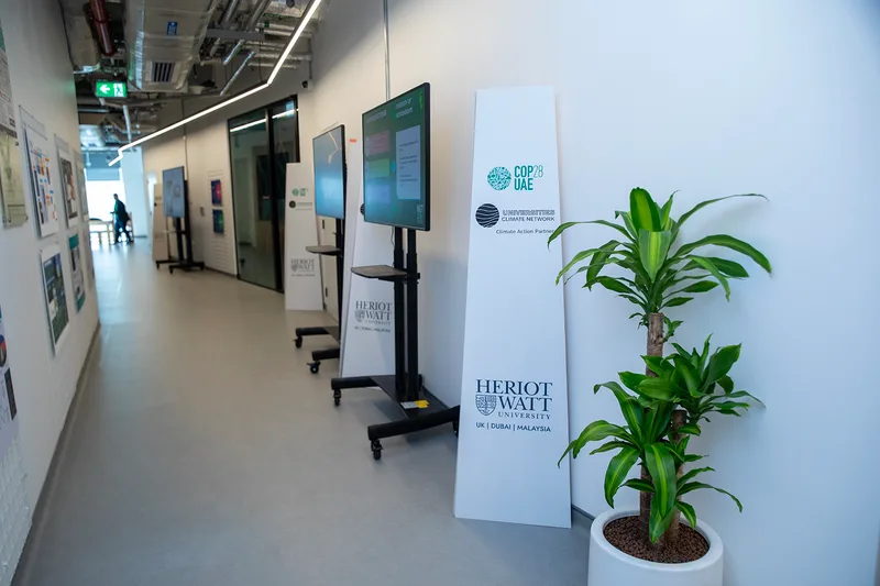 Evolution Scenic custom wooden signage stand with vinyl branding for internal wayfinding.