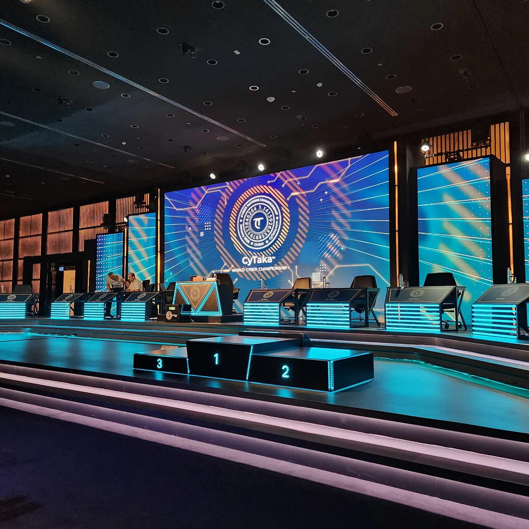 Large LED screens integrated with custom fabricated CYTAKA stage structures and podiums