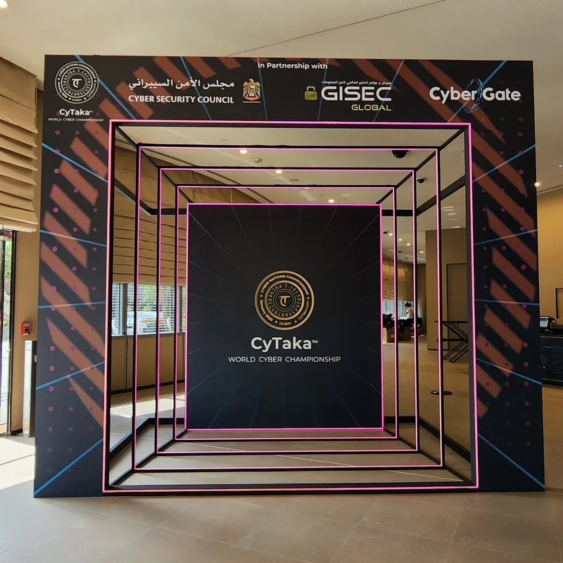 Custom nested-frame photo-op with illuminated detailing fabricated for the CYTAKA championship