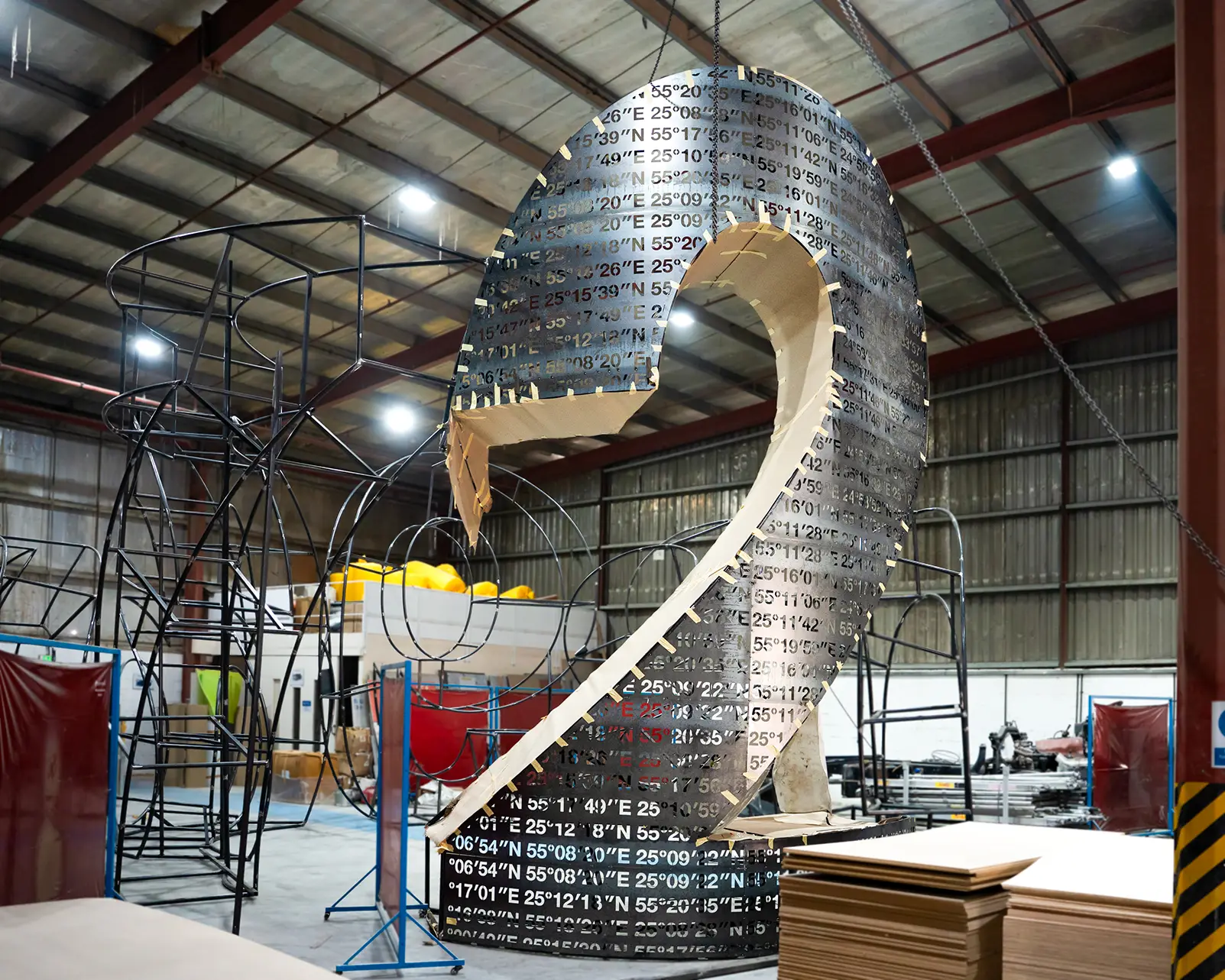 Complex curved scenic steel structure fabricated to support detailed cultural installation finishes
