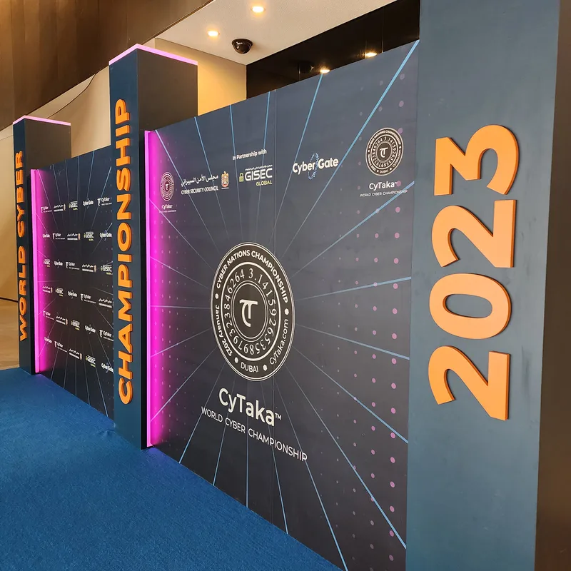 Evolution Scenic branded scenic backdrop with MDF cladding and printed sponsor graphics in Dubai.