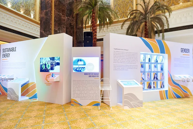 UNIDO Sustainable Energy themed exhibition area with fabricated scenic panels and digital displays.