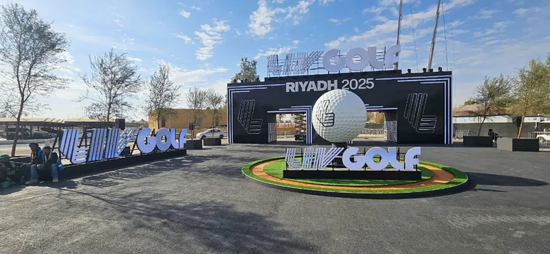 Complete Riyadh Golf Club scenic installation with entrance, rotating sculpture and branded platform.