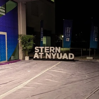 illuminated-stern-at-nyuad-sign-3