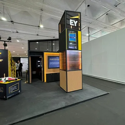 Integrated digital display recessed into the custom fabricated EY COP28 scenic wall structure in Dubai.