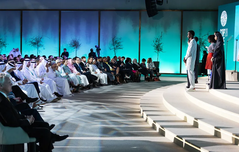 Evolution Scenic fabric-finished steel side walls enclosing the main conference stage.