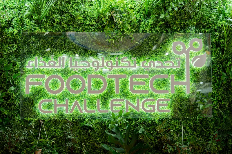 Themed scenic branding integrated into the FoodTech Challenge exhibition environment.