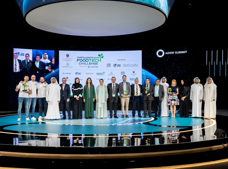 Custom scenic stage and exhibition fabrication delivered at ADNEC