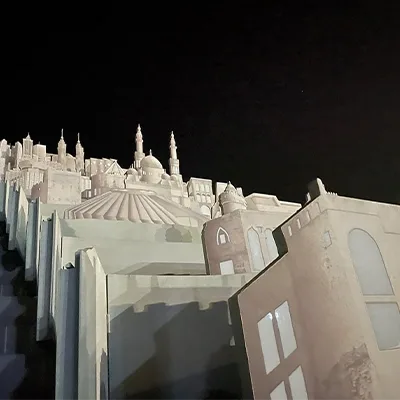 Multi-tier telescopic scenic buildings representing iconic architecture from across the UAE.