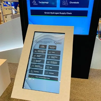 Custom scenic display structures and integrated digital screens within the ADNOC ADIPEC 2022 stan