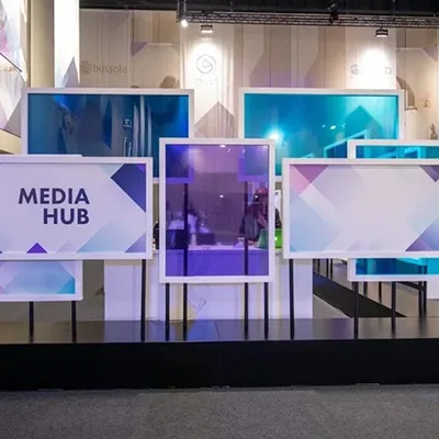 Coloured transparent panels forming the Qudwa–PISA Media Hub scenic installation.