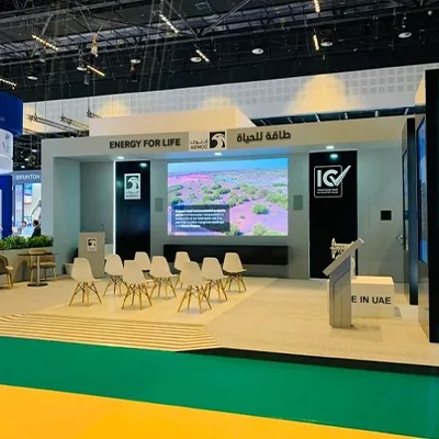 ADNOC Smart Manufacturing exhibition zone constructed with custom scenic walls and digital displays