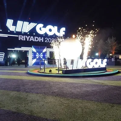 Evolution Scenic rotating golf-ball installation with CNC-machined foam form and branded finish.
