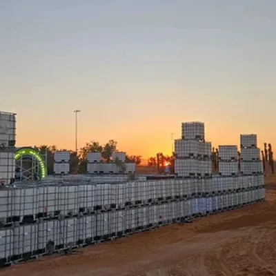 IBC container maze assembled as a large-scale illuminated temporary scenic environment.
