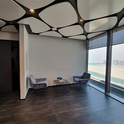 office-lounge-geometric-ceiling-windows.webp