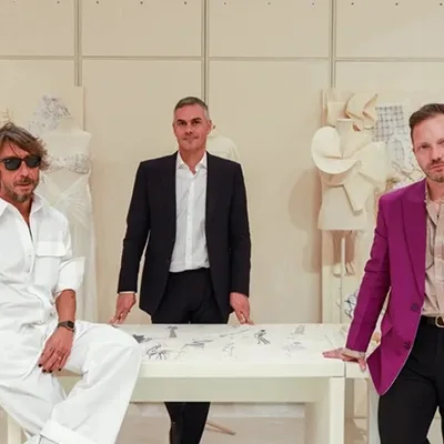 Large-scale architectural scenery fabricated for the Forever Valentino exhibition experience.