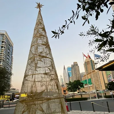 Evolution Scenic restored the open-frame conical Christmas tree with decorative star details.