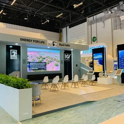 Evolution Scenic exhibition fabrication combining structural framing, MDF cladding, graphics and digital display