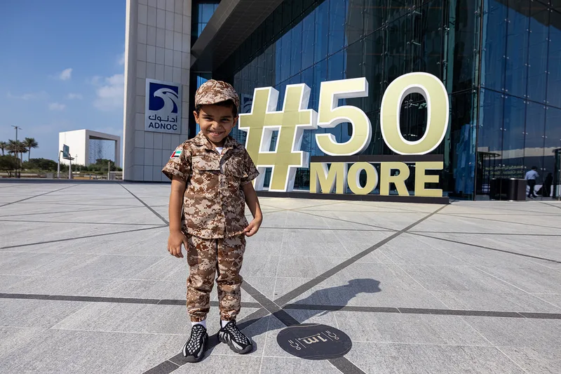 Large freestanding hashtag scenic signage installed for the ADNOC Jubilee Festival.