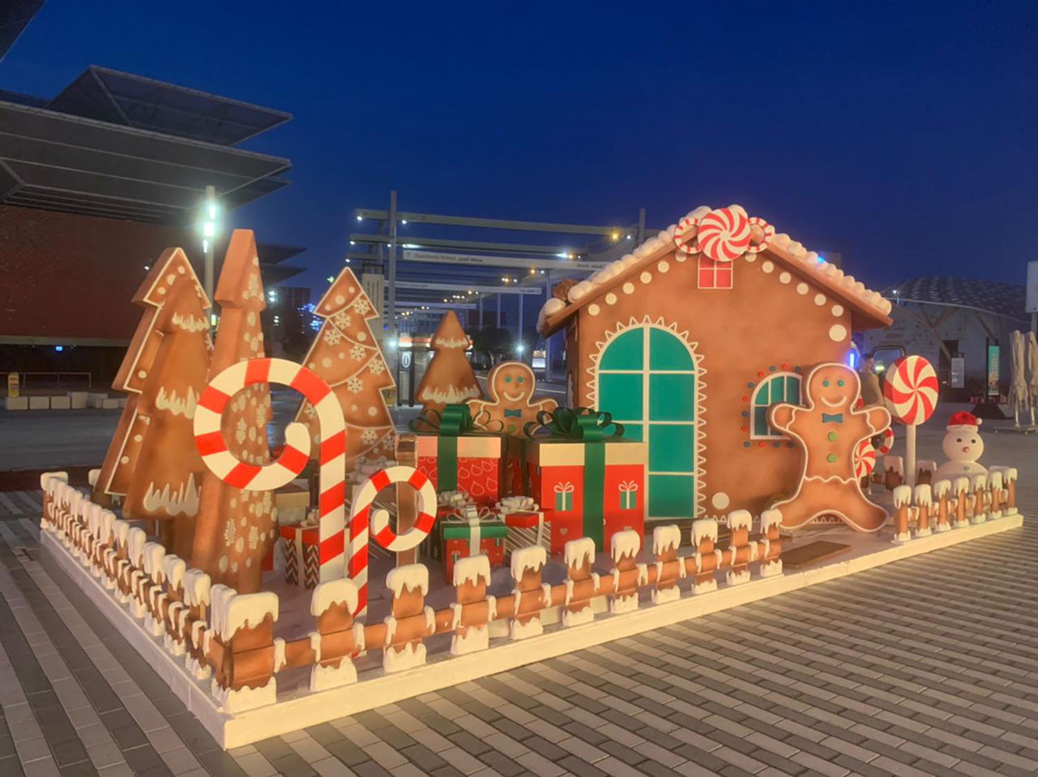 Expo Winter City gingerbread house scenery with painted icing and green window details