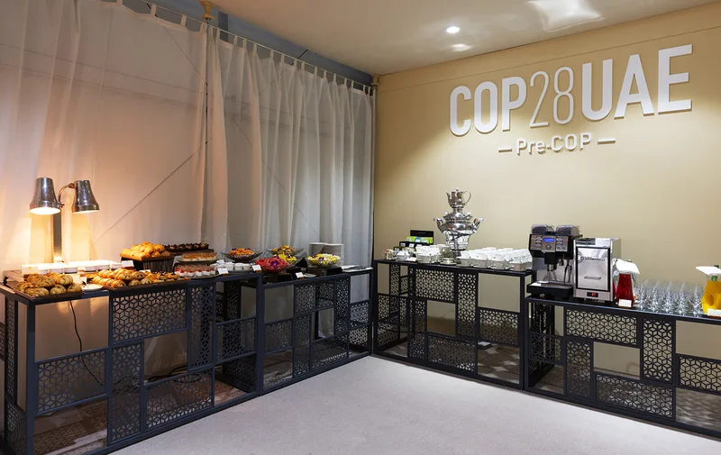 Pre-COP28 meeting room featuring aluminium-framed glass partition and custom fabric walling.