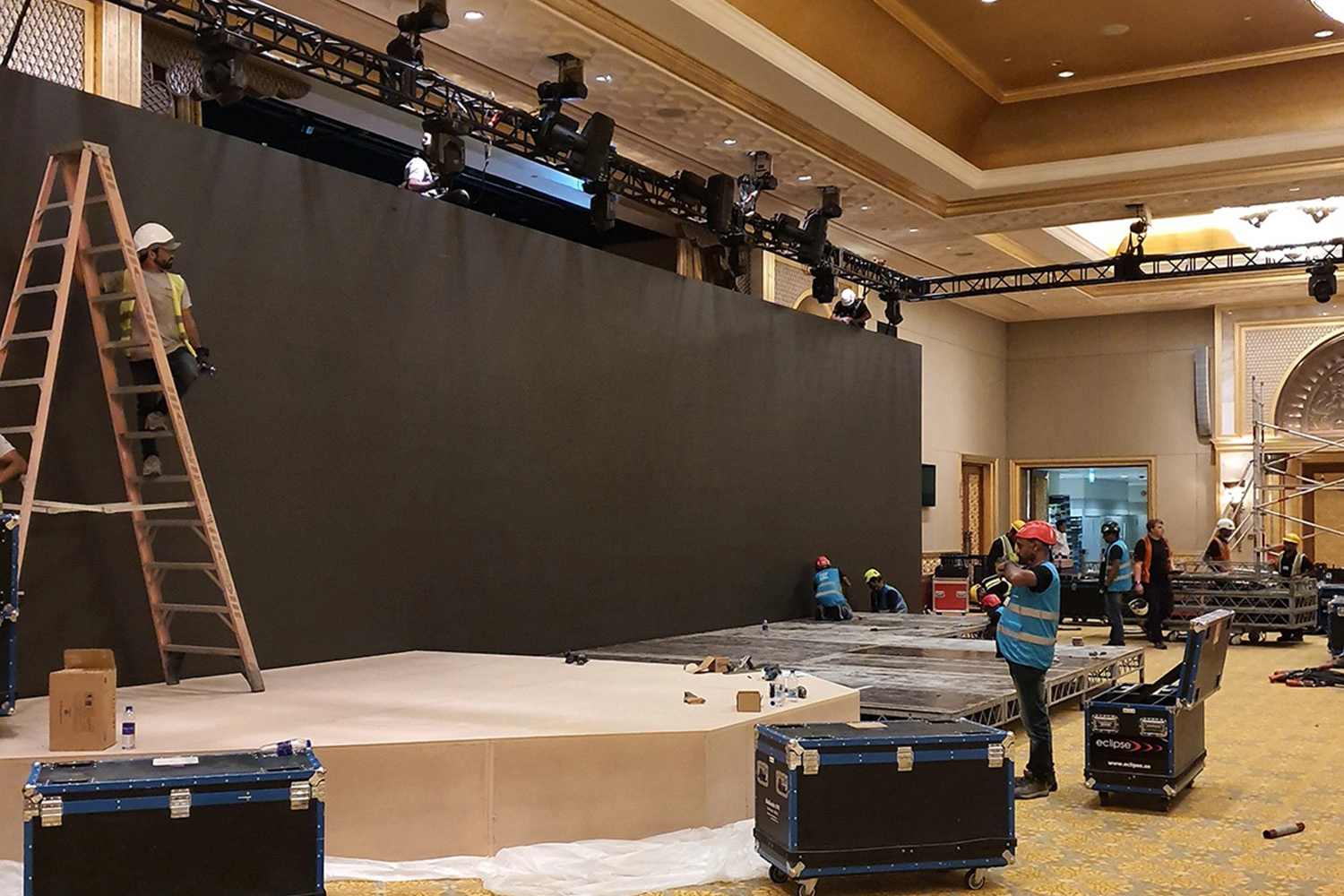 Black drape installation adjusted to remove gaps wrinkles and light leaks
