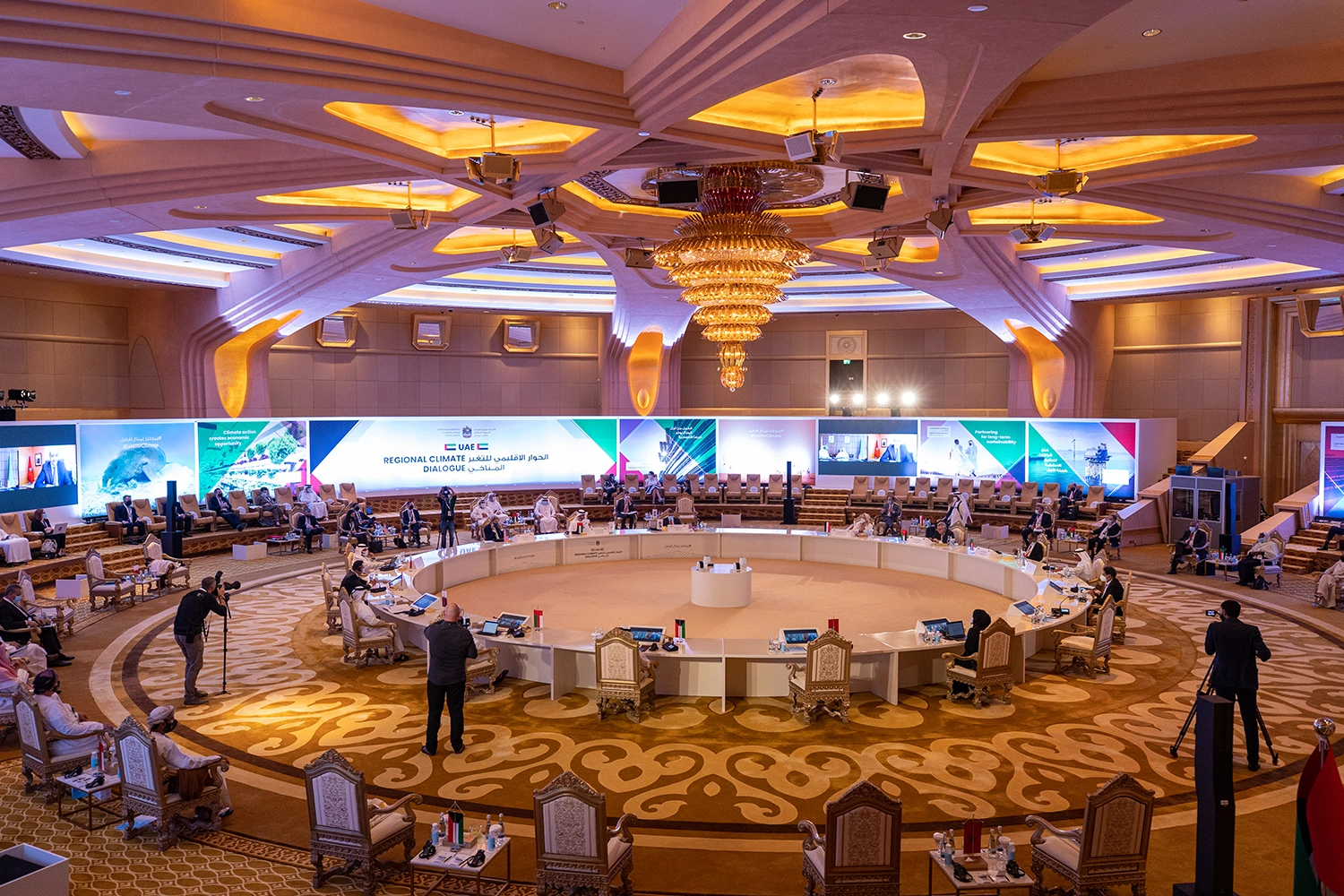Evolution Scenic branded stage and angled graphic walls for the UAE Regional Climate Dialogue.